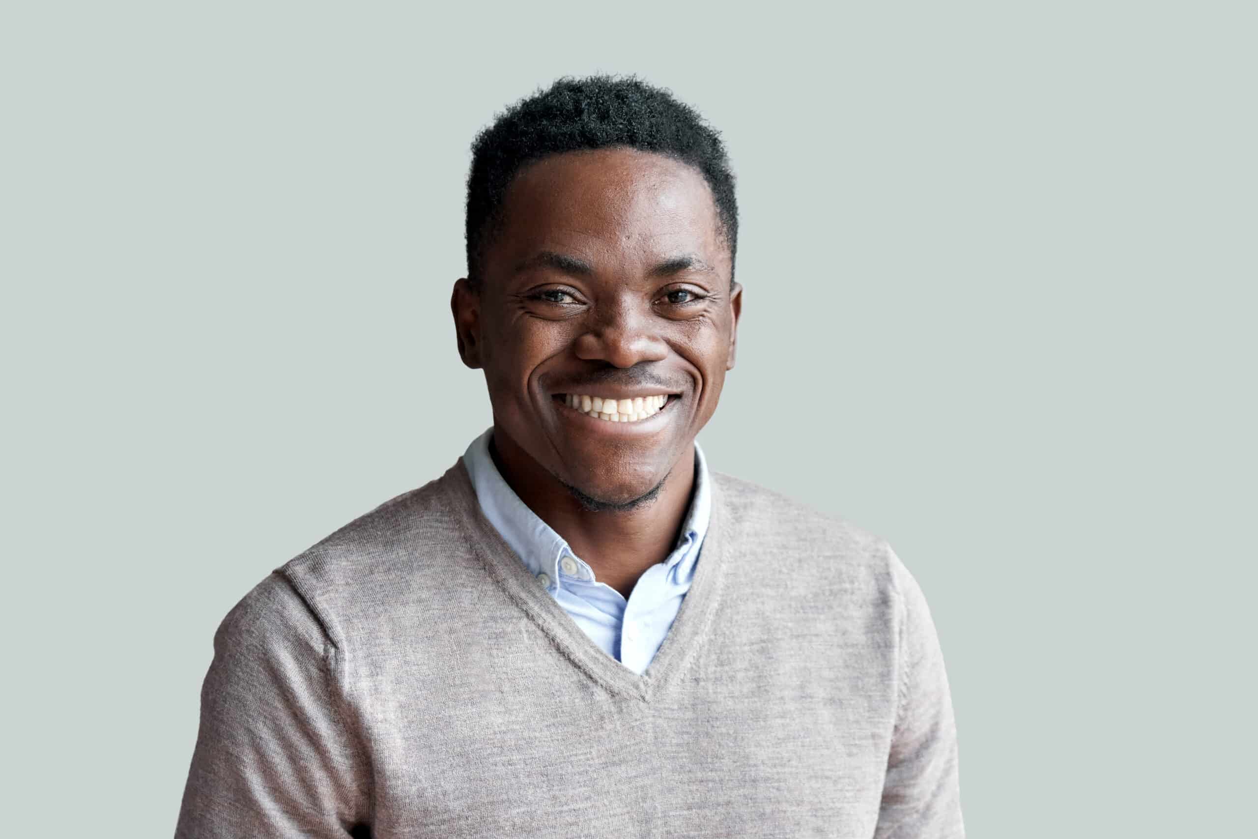 Smiling,Cheerful,Young,Adult,African,American,Ethnicity,Man,Looking,At